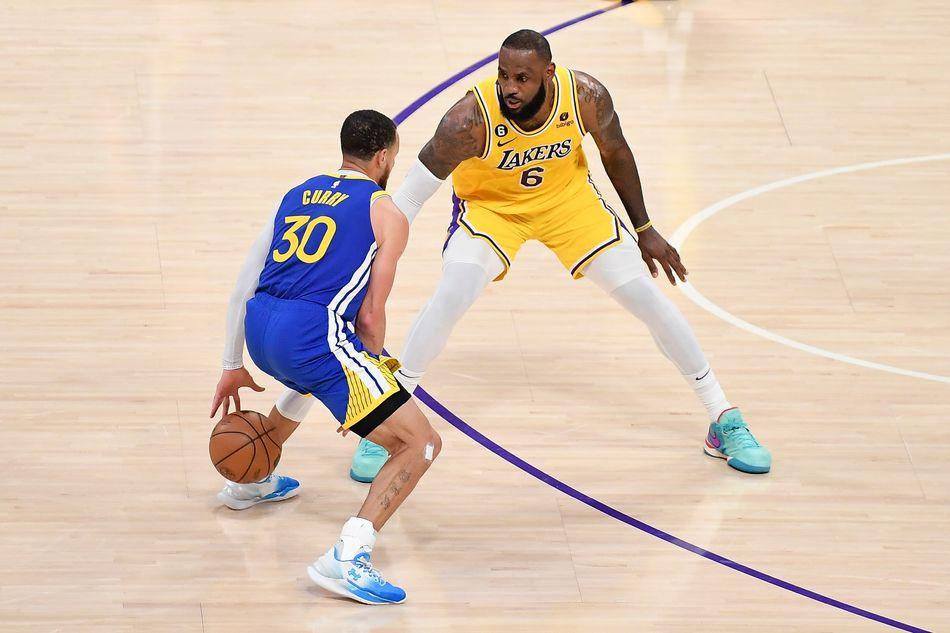 Steph Curry takes on LeBron James during an NBA clash